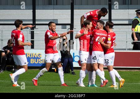 Salford, UK. 28th Aug, 2021. Conor McAleny of Salford city (hidden) celebrates with his teammates after he scores their 2nd goal. EFL Skybet Football league two match, Salford City v Newport County at The Peninsula Stadium in Salford, Greater Manchester on Saturday 28th August 2021. this image may only be used for Editorial purposes. Editorial use only, license required for commercial use. No use in betting, games or a single club/league/player publications.pic by Credit: Andrew Orchard sports photography/Alamy Live News Stock Photo