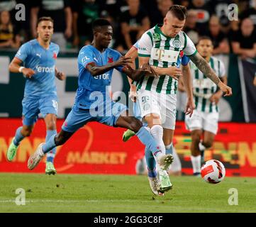 BUDAPEST, HUNGARY - SEPTEMBER 29: Oleksandr Zubkov of Ferencvarosi TC  controls the ball during the UEFA Champions League Play-Offs Second Leg  match between Ferencvarosi TC and Molde FK at Ferencvaros Stadium on