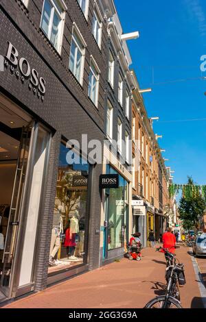 Amsterdam, Holland, Street Scenes, Row Luxury Shops, Townhouses in Old Town Historical Neighborhood, Prestige consumer Stock Photo