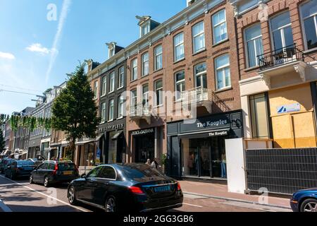 Amsterdam, Holland, Street Scenes, Amsterdam, Townhouses in Old Town Historical Neighborhood, Row of Stores, Luxury Brands Stock Photo