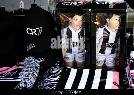 Turin, Italy. 28 August 2021. Two action figures of Cristiano Ronaldo are seen outside Allianz Stadium. Cristiano Ronaldo left Juventus FC on August 27 during summer transfer window to join Manchester United FC. Credit: Nicolò Campo/Alamy Live News Stock Photo