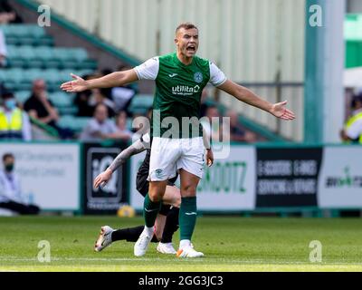 Easter Road, Leith, Edinburg, UK. 28th Aug, 2021. Scottish Premier League football, Hibernian versus Livingston; Ryan Porteous of Hibernian complains to Referee about a foul Credit: Action Plus Sports/Alamy Live News Stock Photo