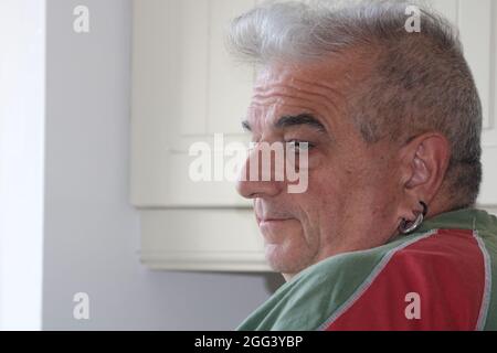 Middle aged white man deep in thought. Stock Photo