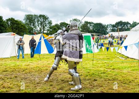 8th August 2021 - Knights in medieval armour at Medieval festival Loxwood Joust, West Sussex, England, UK Stock Photo
