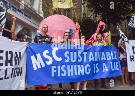 London, United Kingdom. 28th August 2021. Activists outside the Marine Stewardship Council during the National Animal Rights March. Animal rights activists and organisations marched through City of London demanding an end to all animal exploitation. (Credit: Vuk Valcic / Alamy Live News) Stock Photo
