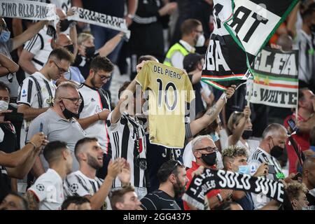 Turin, Italy, 28th August 2021. A fan holds up a jersey bearing the name of Alessandro Del Piero during the Serie A match at Allianz Stadium, Turin. Picture credit should read: Jonathan Moscrop / Sportimage Stock Photo