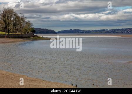 The Arnside Bore, a spectacular tidal bore that forms on the highest tides, approaching Arnside in the Kent Estuary in Cumbria Stock Photo