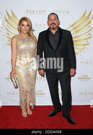 Long Beach, California, USA. 25th August, 2021. Yadi Valerio Rivera and Emilio Rivera attending Amarè Magazine 'Heroes of Change' Awards Gala at the Hotel Maya in Long Beach, California.  Credit: Sheri Determan Stock Photo