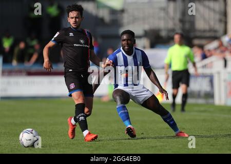 HARTLEPOOL, UK. AUGUST 28TH Zaine Francis-Angol of Hartlepool United in action with Carlisle United's Zach Clough during the Sky Bet League 2 match between Hartlepool United and Carlisle United at Victoria Park, Hartlepool on Saturday 28th August 2021. (Credit: Mark Fletcher | MI News) Credit: MI News & Sport /Alamy Live News Stock Photo