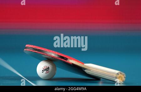 A general view of a table tennis bat and ball at the Tokyo Metropolitan Gymnasium during day five of the Tokyo 2020 Paralympic Games in Japan. Picture date: Sunday August 29, 2021. Stock Photo