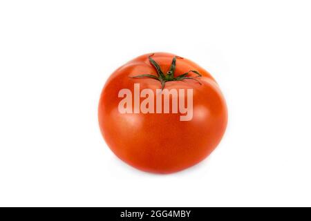 Fresh large single red tomato, isolated on white background. Stock Photo