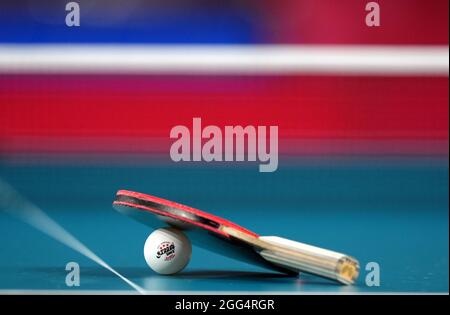 A general view of a table tennis bat and ball at the Tokyo Metropolitan Gymnasium during day five of the Tokyo 2020 Paralympic Games in Japan. Picture date: Sunday August 29, 2021. Stock Photo