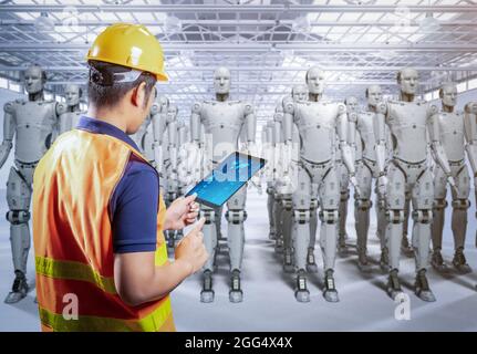 Technician or engineer work with 3d rendering cyborgs in factory Stock Photo