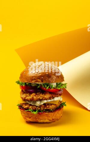 Big burger with with double chicken cutlet Stock Photo