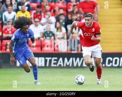 Barnsley, UK. 28th Aug, 2021. Liam Kitching #5 of Barnsley in action during the game in Barnsley, United Kingdom on 8/28/2021. (Photo by Craig Hawkhead/News Images/Sipa USA) Credit: Sipa USA/Alamy Live News Stock Photo