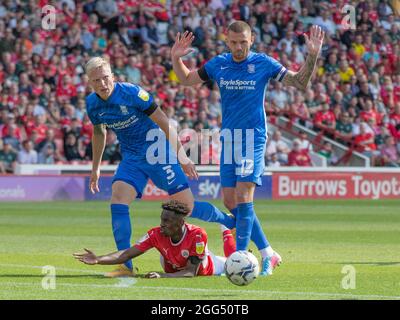 Barnsley, UK. 28th Aug, 2021. Romal Palmer #21 of Barnsley is brought down and appeals in Barnsley, United Kingdom on 8/28/2021. (Photo by Craig Hawkhead/News Images/Sipa USA) Credit: Sipa USA/Alamy Live News Stock Photo