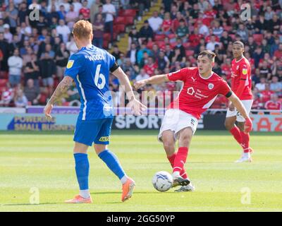 Barnsley, UK. 28th Aug, 2021. Liam Kitching #5 of Barnsley in action during the game in Barnsley, United Kingdom on 8/28/2021. (Photo by Craig Hawkhead/News Images/Sipa USA) Credit: Sipa USA/Alamy Live News Stock Photo