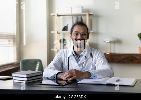 Portrait of smiling 30s young african american doctor. Stock Photo