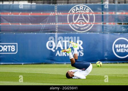Kylian Mbappe of PSG falls during a training session at the Camp des Loges Paris Saint-Germain football club's training ground in Saint-Germain-en-Laye, near Paris, France on August 28, 2021. Photo by Victor Joly/ABACAPRESS.COM Stock Photo
