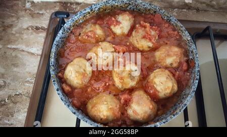 spiced chickpeas balls in tomato sauce Stock Photo