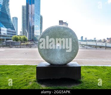 LONDON, UNITED KINGDOM - Aug 10, 2021: The sculpture Vanishing Point by Jay Battle in Westferry Circus, Canary Wharf, London, UK Stock Photo