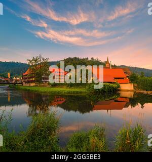 A summer sunrise with the Half-Timbered Houses in Schiltach, a town in the district of Rottweil, in Baden-Württemberg, Germany. It is situated in the Stock Photo