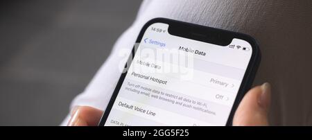 Mobile data setting screen on mobile phone close-up. Cellular data on smartphone. Banner Stock Photo