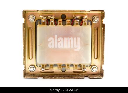 Electrical transformer (square type) for mains voltage reduction isolated on white background Stock Photo