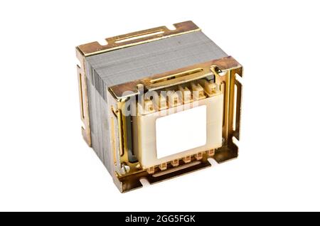 Electrical transformer (square type) for mains voltage reduction isolated on white background Stock Photo