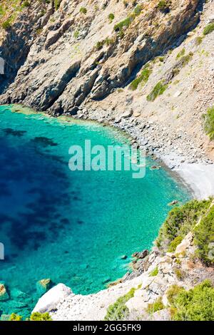 The Punta Nera beach in Italy is located on the western side of the Elba coast, about 2 km away from the village of Chiessi Stock Photo