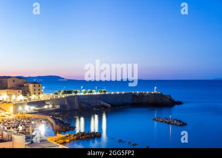 Piazza Bovio at sunrise, Piombino, Italy. It is the largest square surrounded by the sea in Europe Stock Photo