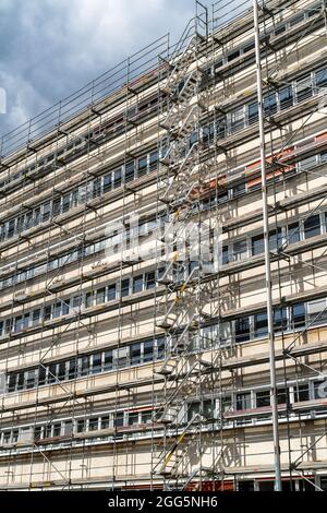 A scaffold on an older skyscraper Stock Photo