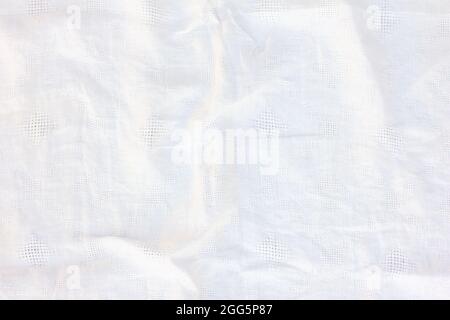 Light beige linen textile background with pleats. Empty space for copying Top view Stock Photo