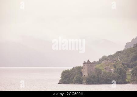 I love this vantage point overlooking Urquhart Castle and Bay on Loch Ness, particularly on days when the weather isn't 'good' as it becomes increasin Stock Photo