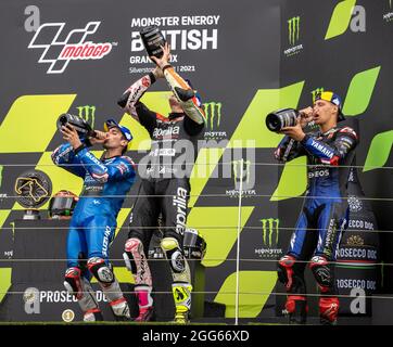Silverstone Circuit, Silverstone, Northamptonshire, UK. 29th Aug, 2021. MotoGP British Grand Prix, Race Day; The riders take a drink of the Prosecco Credit: Action Plus Sports/Alamy Live News Stock Photo