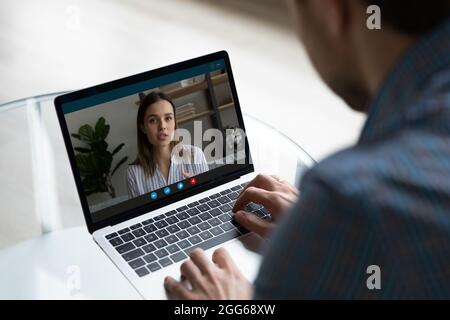 Employer and candidate having remote job interview on virtual conference Stock Photo