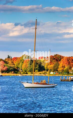 Classic wooden ketch at its mooring on the Mystic River in Connecticut. Stock Photo