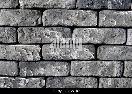 grungy bricks texture background. aged rough bricks wall template for text and design. modern loft style rough texture Stock Photo