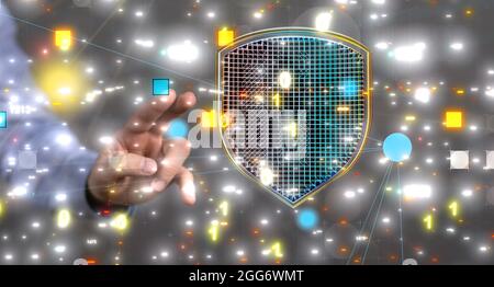 Hand touching cyber shield - the concept of data security Stock Photo