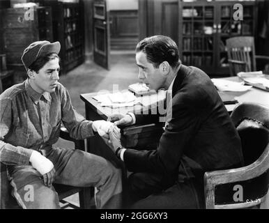 BILLY HALOP and HUMPHREY BOGART in CRIME SCHOOL 1938 director LEWIS SEILER story Crane Wilbur screenplay Crane Wilbur and Vincent Sherman dialogue director Vincent Sherman music Max Steiner Warner Bros. Stock Photo