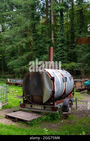 making charcoal in West Dean woods, West Sussex, UK Stock Photo