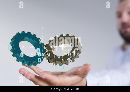 A digital concept of success with gears and binary code Stock Photo