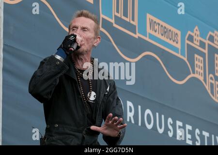 Portsmouth, UK. 28th Aug, 2021. Vocalist Rob Birch of Stereo MCs Hip hop group performs live on stage at the Victorious Festival. Credit: SOPA Images Limited/Alamy Live News Stock Photo