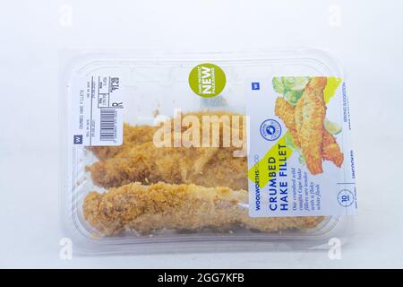 Johannesburg, South Africa - Woolworths Food crumbed hake fillets isolated on a clear background Stock Photo