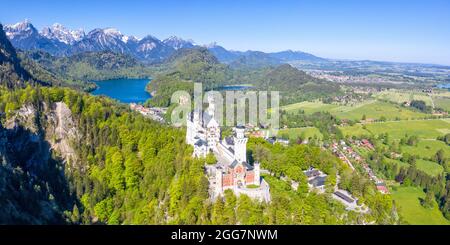 Schloss Neuschwanstein castle aerial view architecture Alps landscape Bavaria Germany travel panoramic view from above Stock Photo