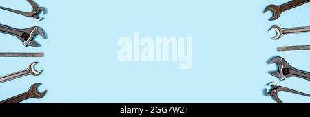 Happy father's day or labor day long banner with copy space. Man or husband concept. Different wrenches on blue background. Stock Photo