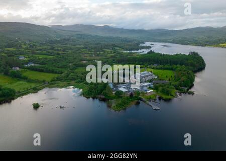 A landscape of hills covered in greenery surrounded by Lough Eske in Donegal, Ireland Stock Photo