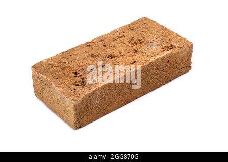 Solid clay bricks used for construction, old red brick, made in Brazil, isolated on white background. Stock Photo