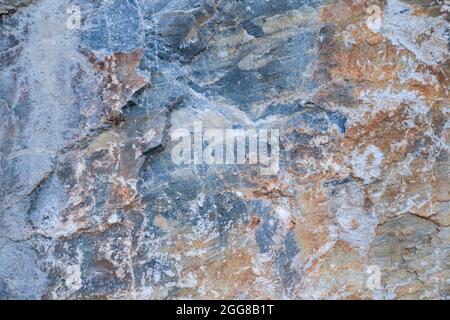 Texture of stone surface with gray, brown and white colors. Top view. Stock Photo