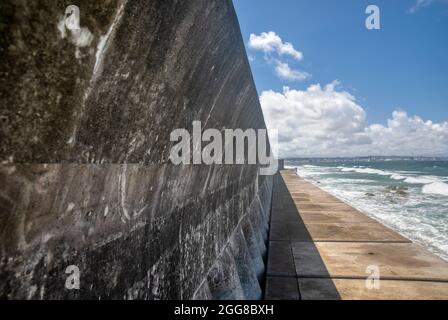 Recurved Sea Wall in Okinawa, Japan Stock Photo